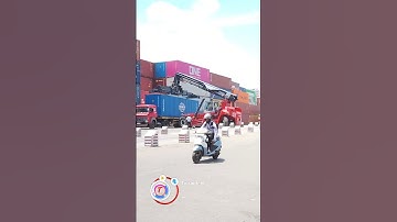 Kalmar Reach stacker with a tilting spreader for container handling