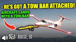 AIRCRAFT FLIES AND LANDS WITH TOWBAR STILL ATTACHED TO FRONT GEAR [ATC AUDIO]
