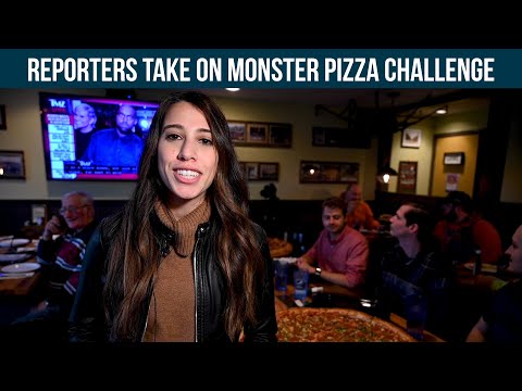 MLive Reporters take on Thompson Pizzeria's Monster Pizza Challenge