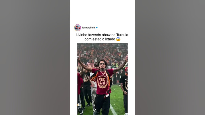 Mc livinho cantando no estádio lotado na Turquia