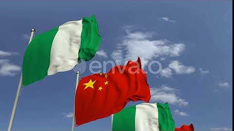 Flags of Nigeria and China Against Blue Sky | Motion Graphics - Envato elements