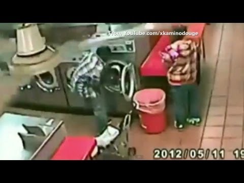 Man stuffs baby in spinning washer