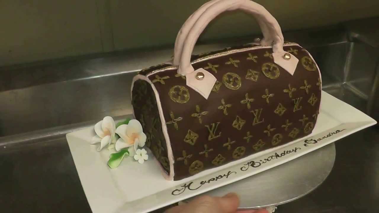 Making a Louis Vuitton purse cake… #pursecake #ediblecake #LV #cakes