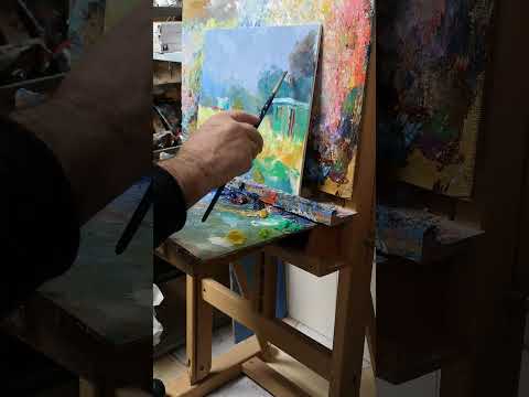 Il pittore Giuseppe Faraone dipinge un paesaggio
