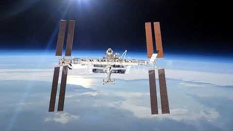 International Space Station Over The Planet Earth | Motion Graphics - Envato elements