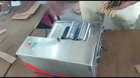 Paper bag handle pasting machine