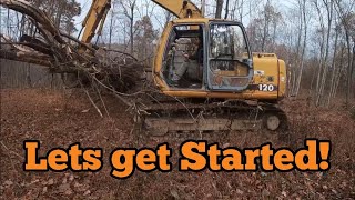 Land clearing with John Deere 120 excavator