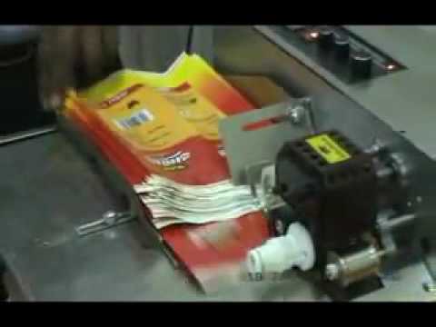 HIGH SPEED STAMPING HOT INK ROLLER CODING M/C. FOR MANUAL PACKAGING