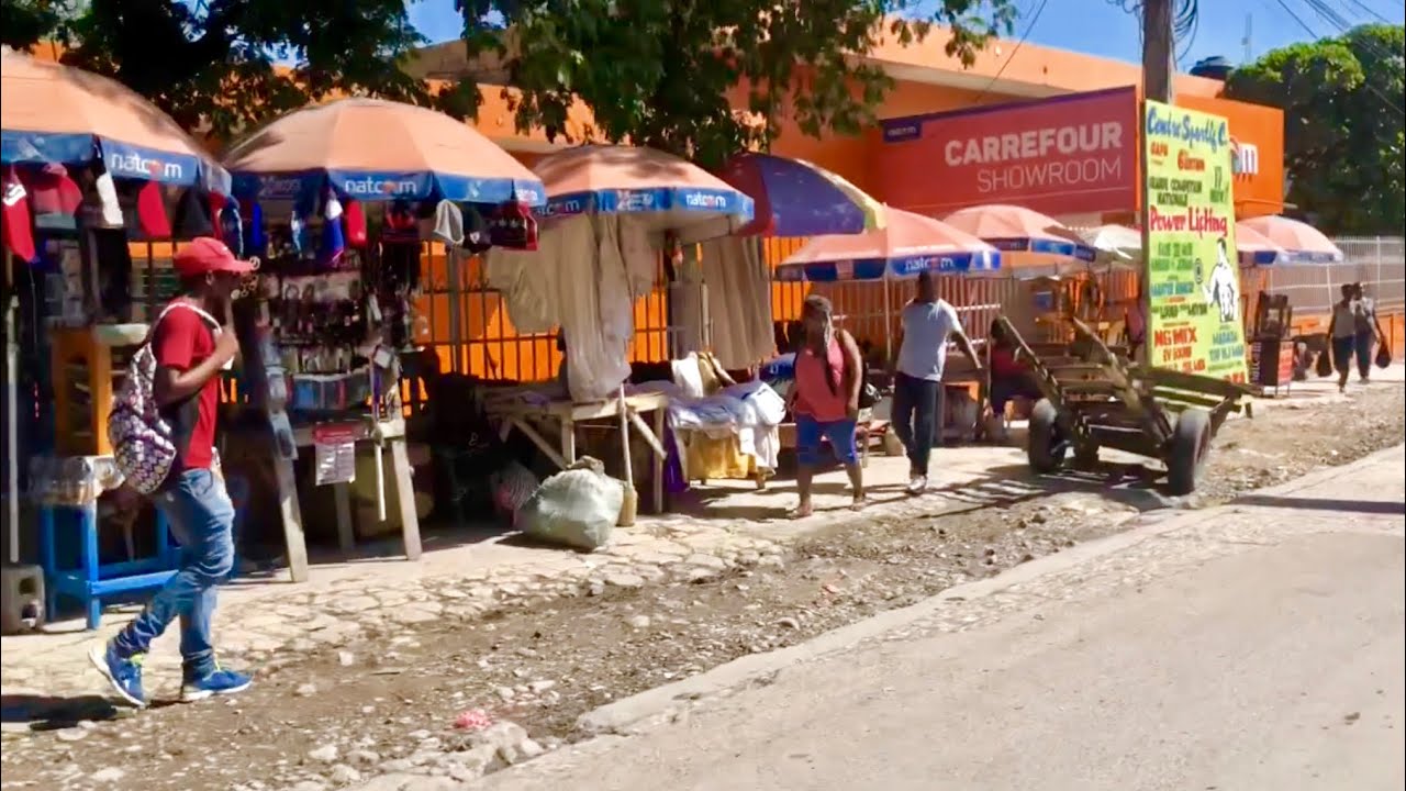 Cruising through Carrefour, Haiti on the way to the Orphanage “Timoun