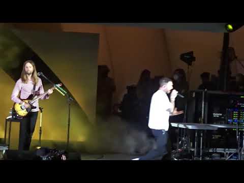 Fan climbs on stage to hug Adam Levine of Maroon 5 during We Can Survive concert - Hollywood Bowl