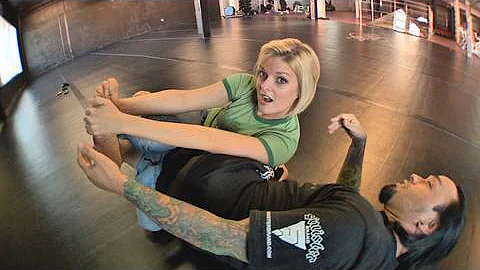 Eddie Bravo shows the Vaporizer leg lock on Joanne...