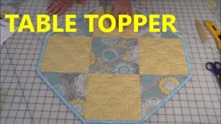 Easy to follow instructions for creating an octagon shaped table topper using a classic quilt 9-patch pattern. Basic quilting skills are 