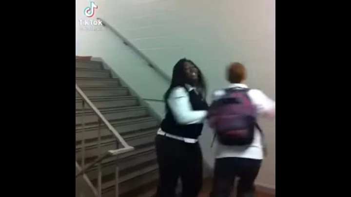 Stan Twitter: Girl walking down stairs and pushing a person as Boss A*s B*tch plays