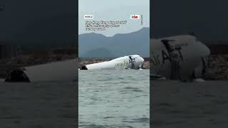 Two Hong Kong airport staff killed after cargo plane runway crash
