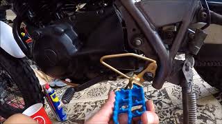 YAMAHA TW 200 Footpegs Spring Installation