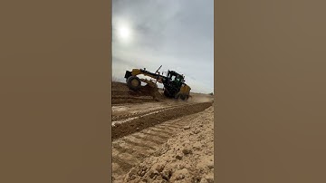 Cutting a 1 to 1 slope with a cat 12m