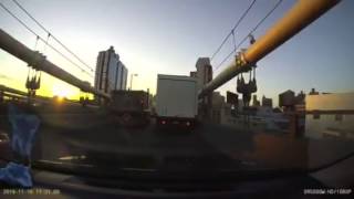 Trucker hits bridge and almost hits dump truck