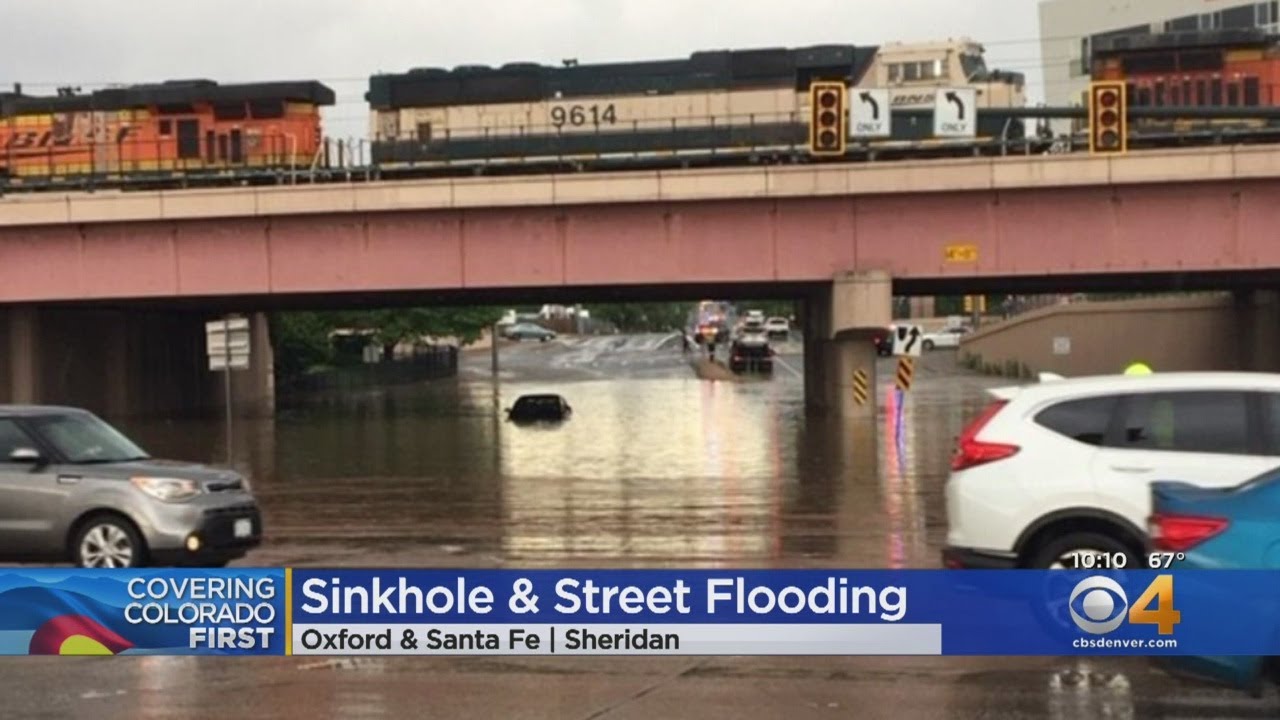 Sinkhole, Heavy Flooding Along Santa Fe Drive Make For Troublesome Commute Home