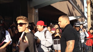 Justin Bieber greeting fans arriving and departing Power 106