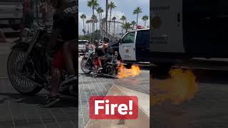 Fire Throwing Motorcycle In Front Of Police Van Mayhem At The Beach