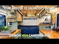 Our 75sqft composite box house is almost done  flooring  trim  unimog 4x4 camper build 24