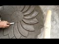 Wall flower design in cement plaster