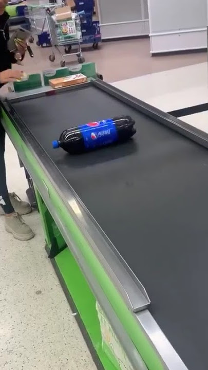 Girl rolls bottle of Pepsi down supermarket conveyor belt and i scans itself | CONTENTbible