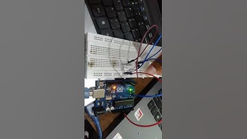 Arduino Uno menggunakan 1 push button dan 1 lampu