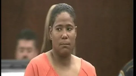 Woman accused of kidnapping and killing 12 years o...