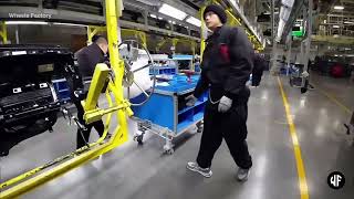 First-hand view: Lynk & Co worker assembling car's passenger seat glovebox.