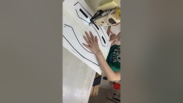 May cổ áo vest bằng rập cải tiến.