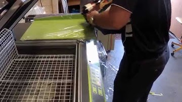 Gift Hampers being Shrink Wrapped on an All-in-One 4-GPEKH 455 Shrink Wrapper  - Chamber Machine