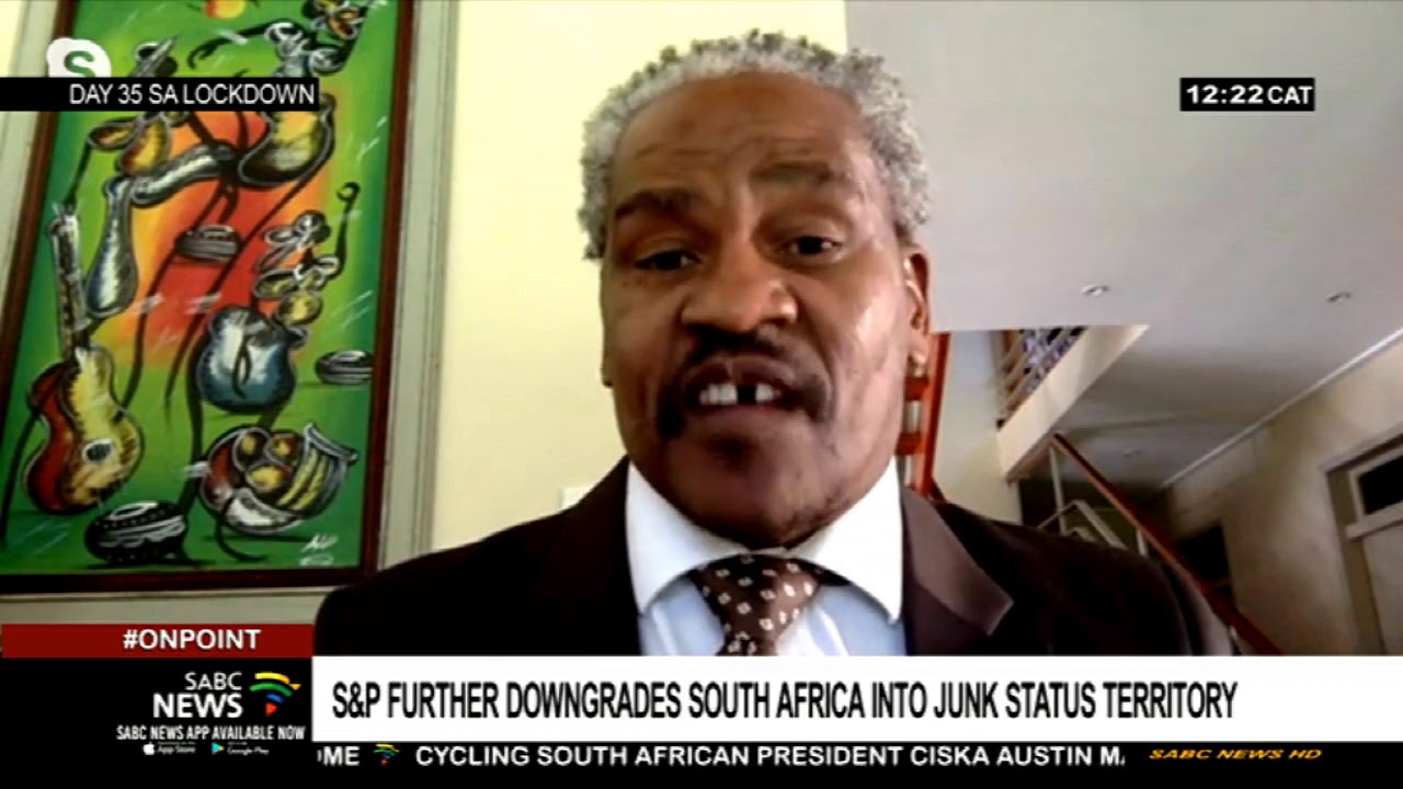S&P further downgrades South Africa into junk status territory - YouTube