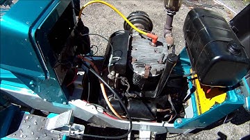 128 cub cadet pulling tractor