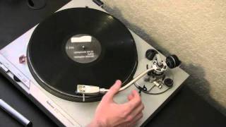 Using an anti-static record brush