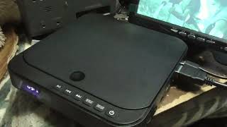 I bought a mini DVD player. I actually wanted a Blu-ray