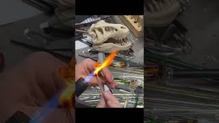 Crafting Glass Dinosaurs with Precision and Fire