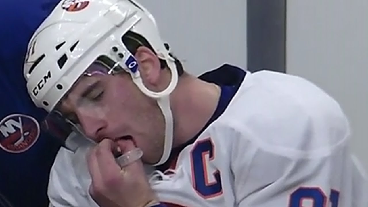 nhl player pulls out tooth