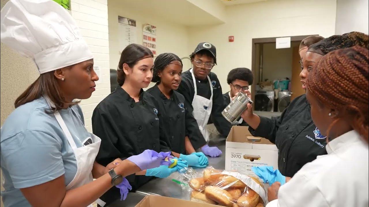 Dr. McDade participates in the Potomac High School Culinary Mystery Box