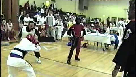 Guy Bracali's student Tyree Jones ( in Blk/Rd )