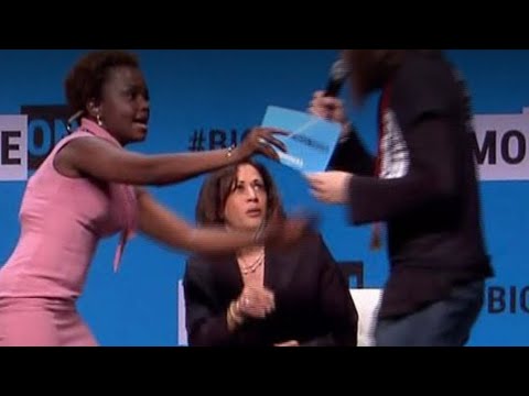 Protester Storms Stage, Grabs Mic From Kamala Harris at Event