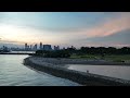 Slow motion video @ Gardens by the bay east shoreline break water 