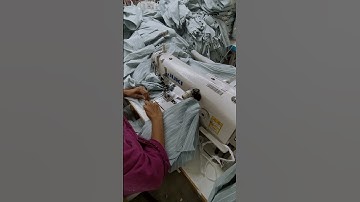 Fancy sleeve join. Chain stitch machine.  Fastest work...  Can do easily