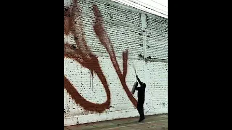 graffiti tagging with a fire extinguisher