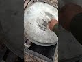Collect honey from the tree and pour it into a container.