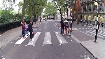 Angry Pedestrian Blocks Cyclist As He Races Through Zebra Crossing