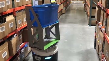 The Future of Warehousing: AMRs in Action | Autonomous Mobile Robots moving through the warehouse