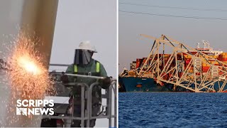 Dali crew remains on board as bridge cleanup continues to free cargo ship