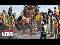 Rescue operations continue after South African building collapse