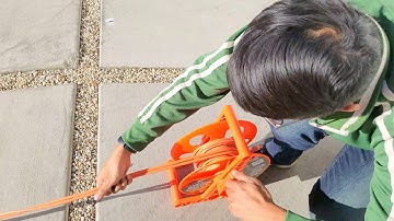 Coil and store extension cords w/ a wind-up cord reel. Quick, neat, easy!